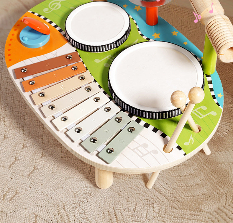 Set de percusión infantil 5‑en‑1 con instrumentos de madera eco‑friendly, 2 tambores, metalófono de 8 notas, platillo, güiro, carillón y 2 baquetas