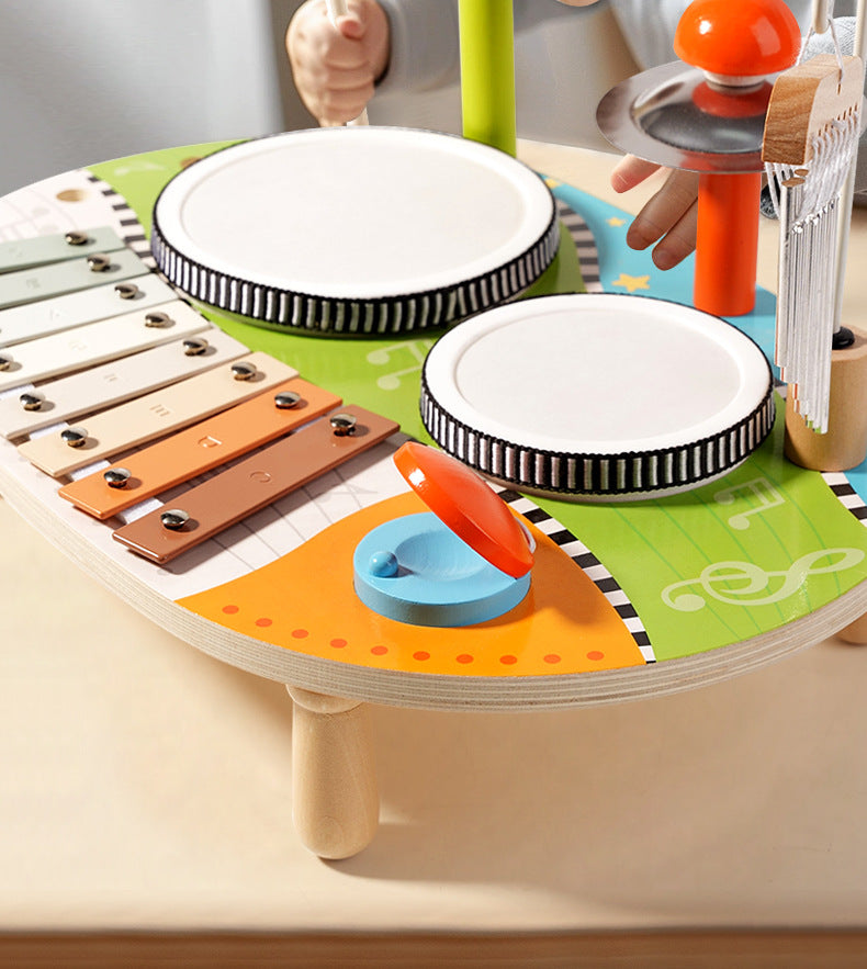 Set de percusión infantil 5‑en‑1 con instrumentos de madera eco‑friendly, 2 tambores, metalófono de 8 notas, platillo, güiro, carillón y 2 baquetas