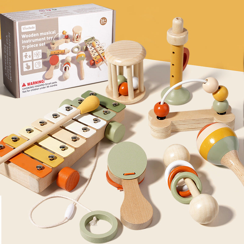 Set musical infantil 7-en-1 con metalófono, flauta, maraca, pandero y sonajeros en madera eco-friendly y su empaque
