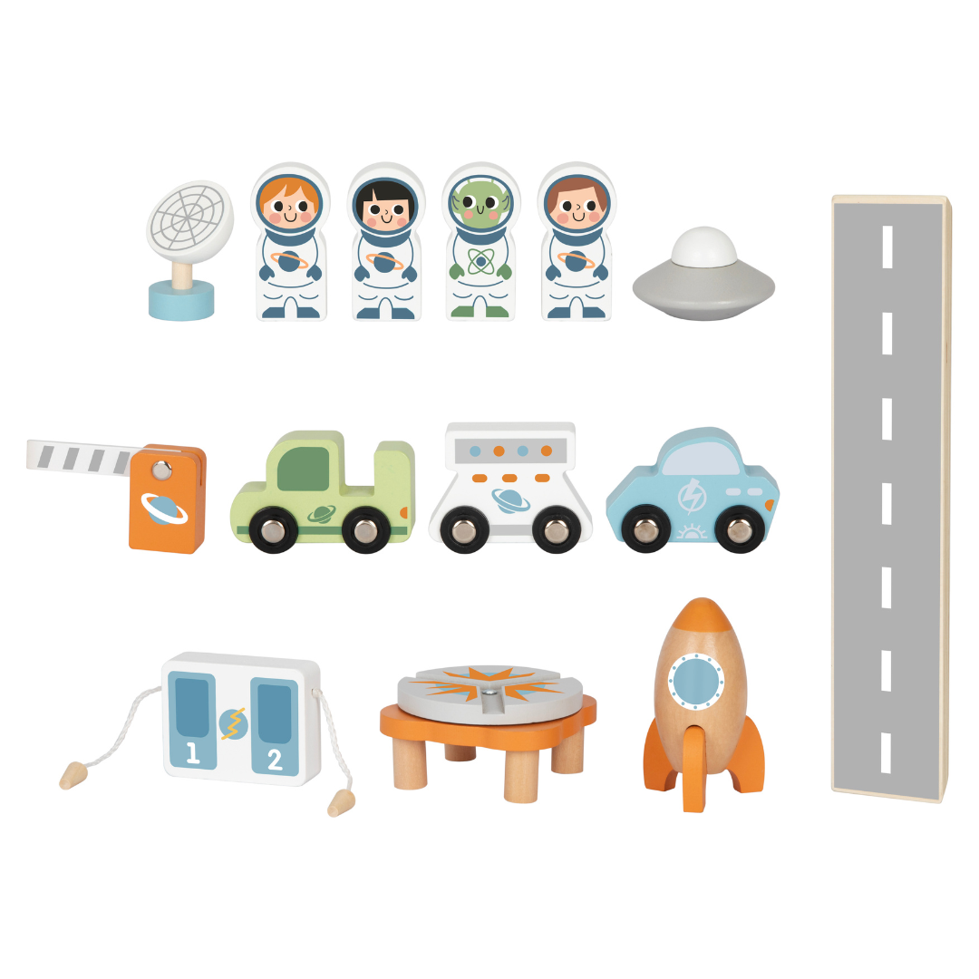 juguete estación espacial de madera con cohete, platillo volador, distintos vehículos, astronautas y un extraterrestre